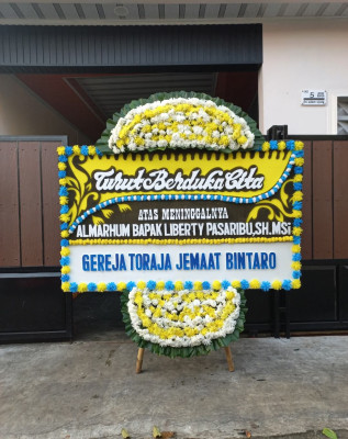 Papan Bunga Duka di Cinta Damai